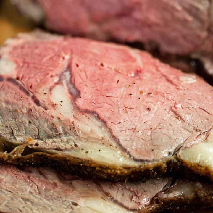 Two slices of boneless prime rib roast up close