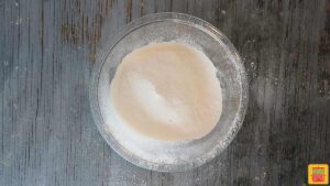 Sifted flour into a glass bowl