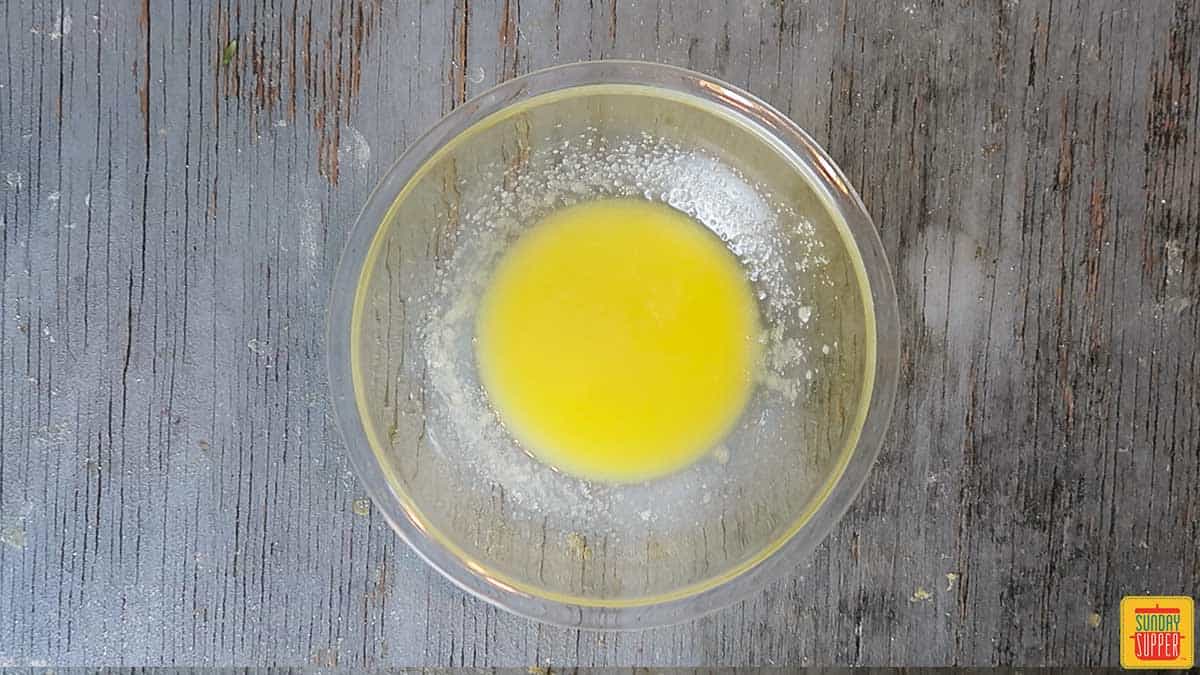 Butter and sugar mixed in a bowl