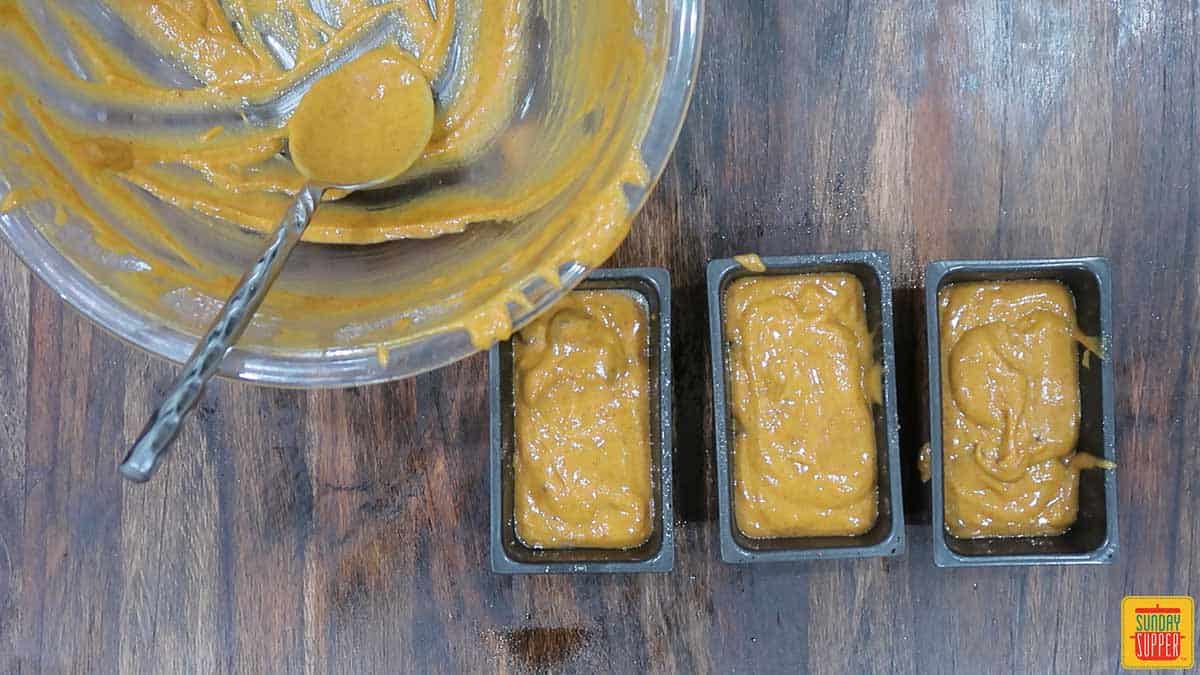 Pouring batter into mini loaf pans