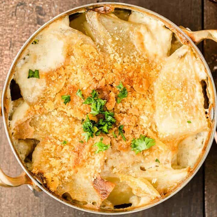 Overhead view of Swedish potato casserole Janssons Frestelse in a baking dish with handles