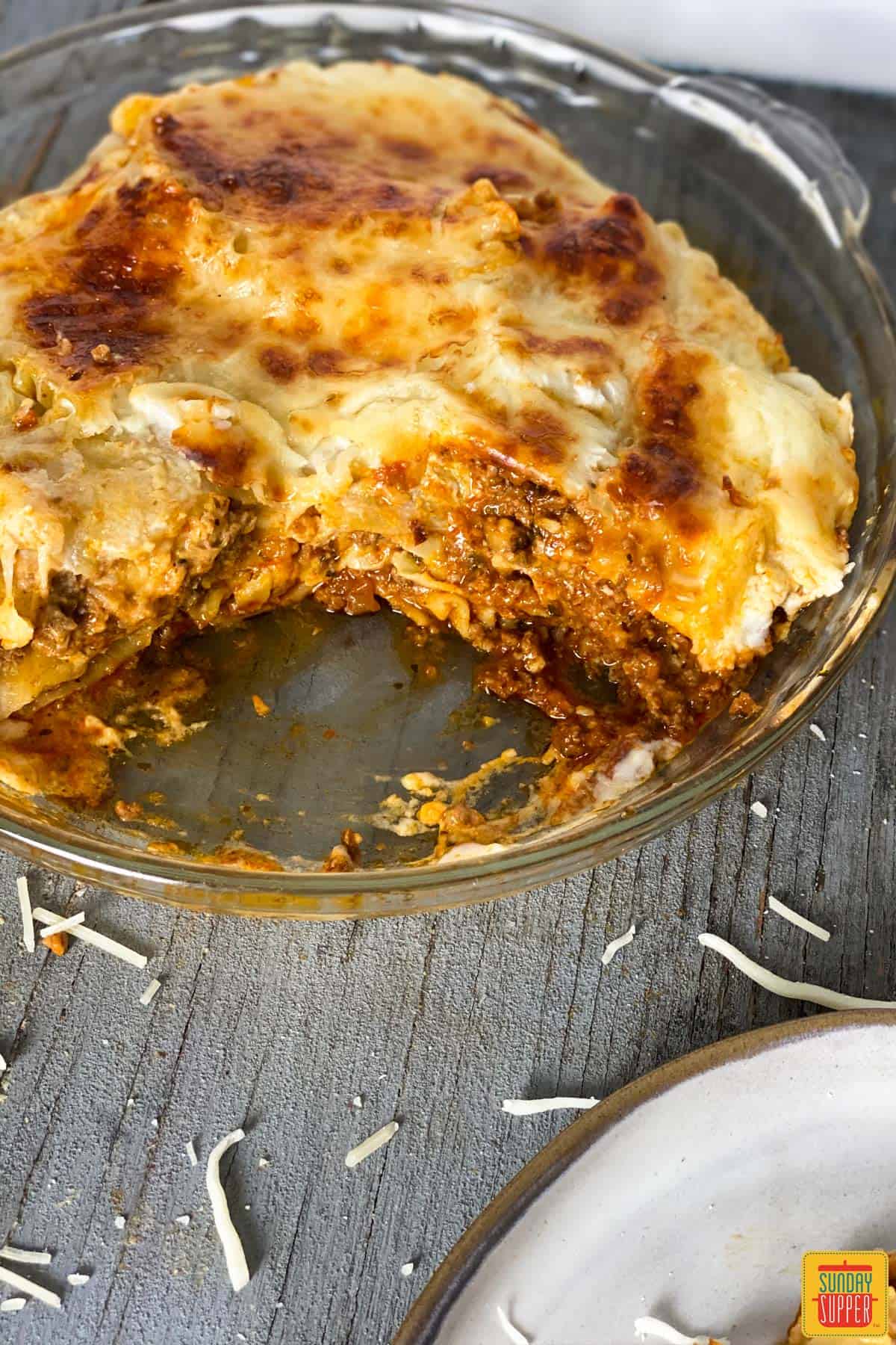Close up of instant pot lasagna in a glass baking dish