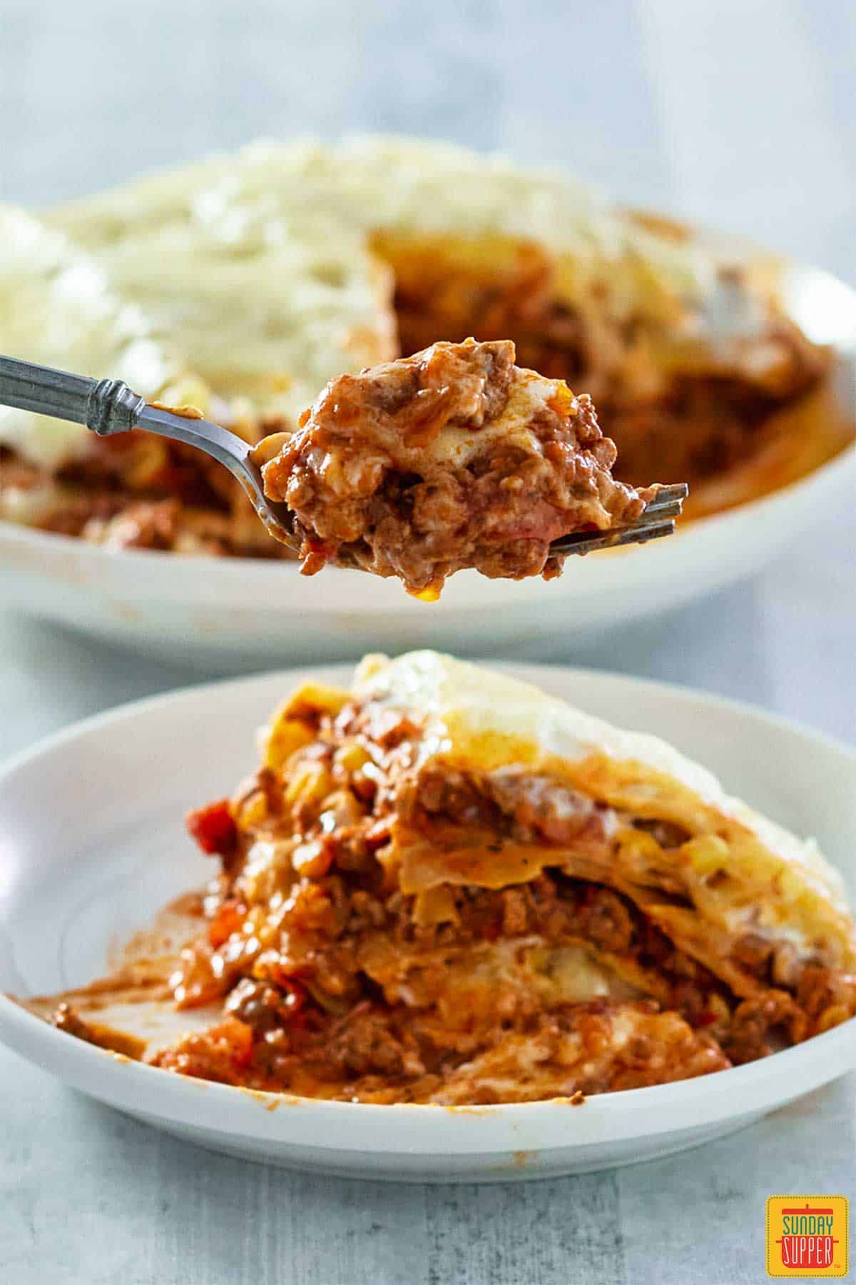 instant pot lasagna in dish and on plate with forkful of lasagna