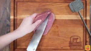 Cutting a steak in half