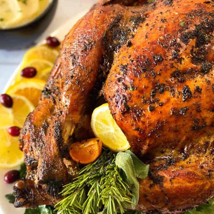 Grilled turkey recipe up close stuffed with citrus and herbs