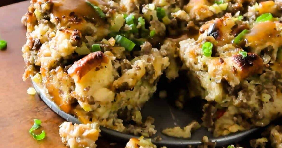 Instant pot sausage sage stuffing topped with parsley on a wooden board