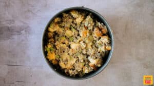 Instant pot sausage sage stuffing in a springform pan ready to cook