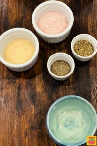 seasoning to make rosemary salt mixture in separate bowls