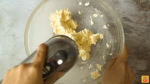 Beating butter in a glass bowl