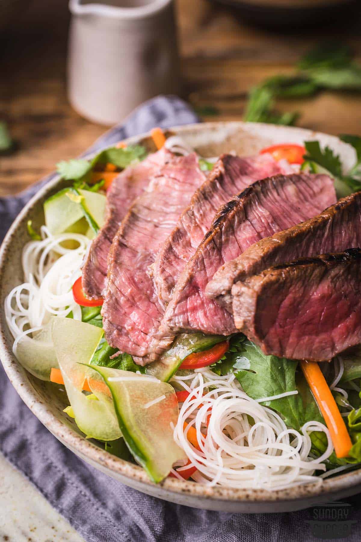 Vietnamese beef salad in a bowl close up