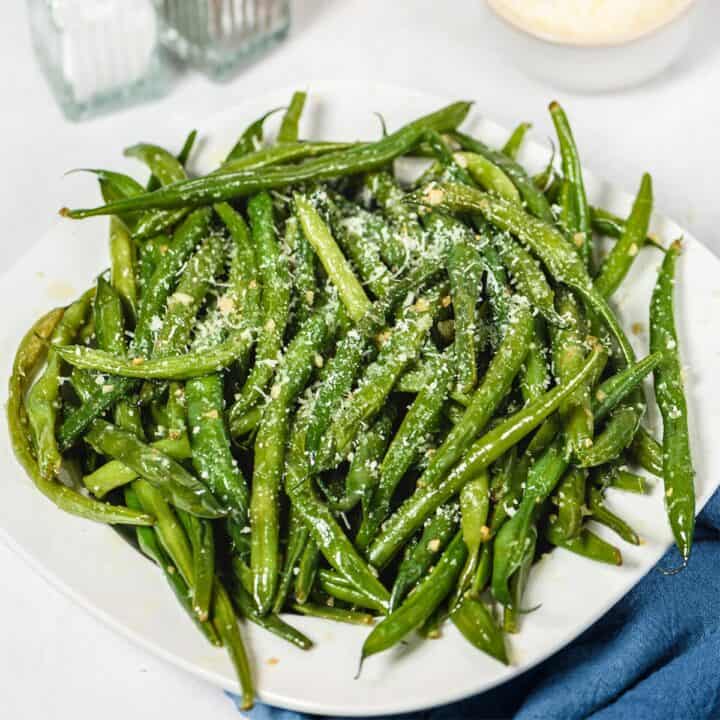 Instant pot green beans on a white plate