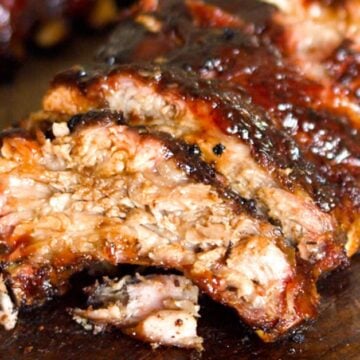 Baby back ribs close up on a cutting board