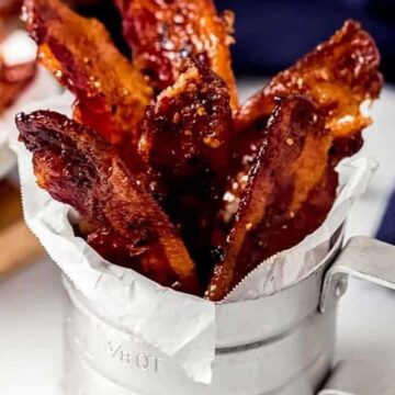 Candied bacon in a silver tin.