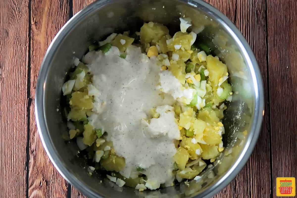 Potato salad dressing on salad in instant pot
