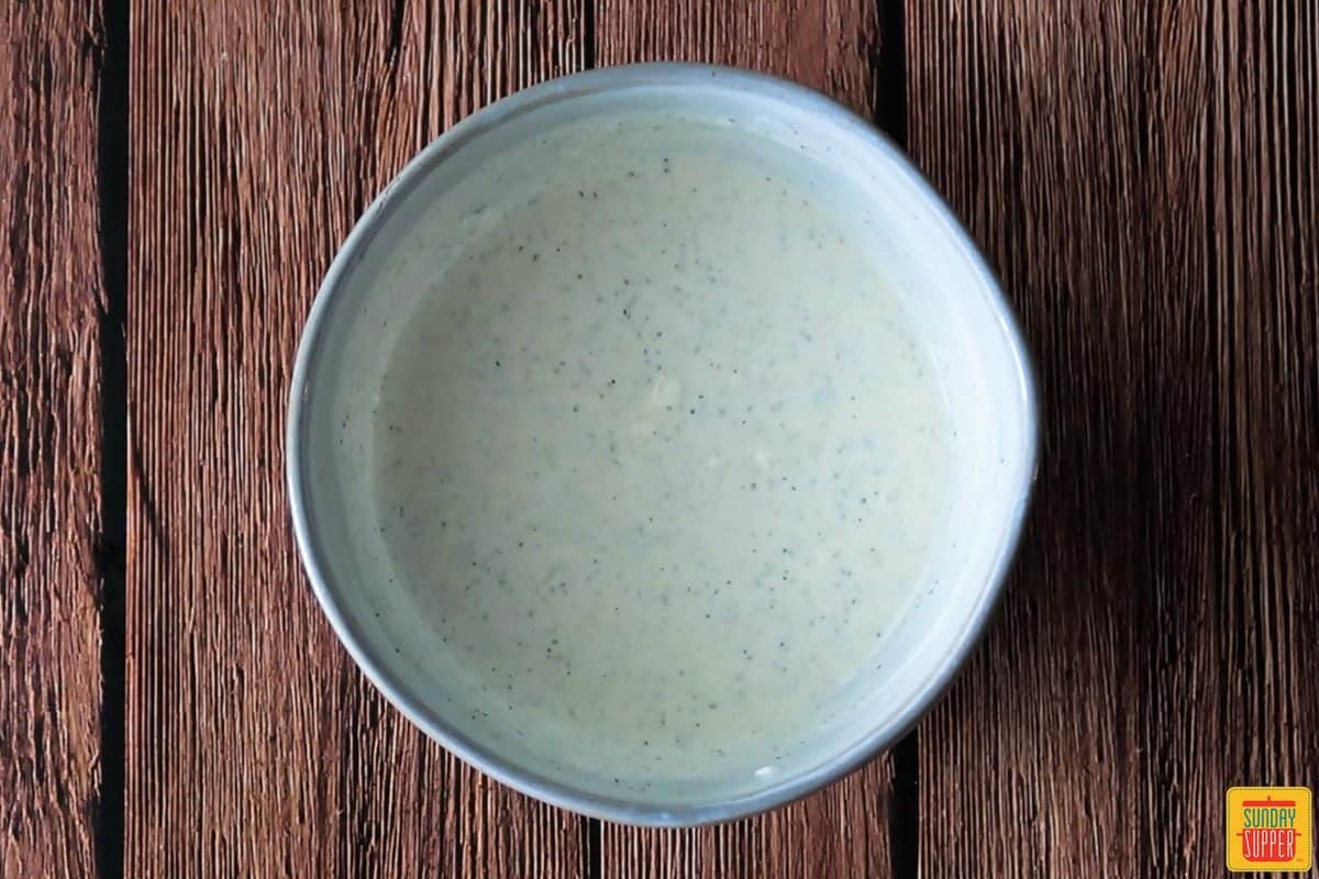Potato salad dressing mixed in a bowl