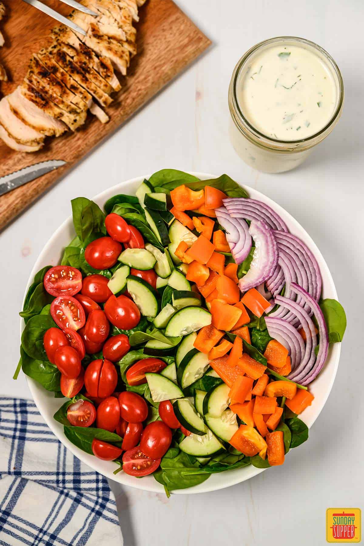 Veggies in a bowl for making grilled chicken salad