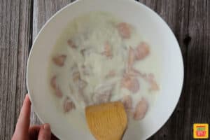 Chicken marinating in bowl