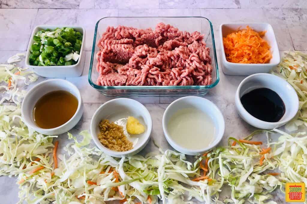 Ingredients to make egg roll in a bowl on a countertop