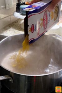 Cooking Mueller's elbow pasta in a pot