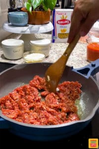 browning sausage in a pan