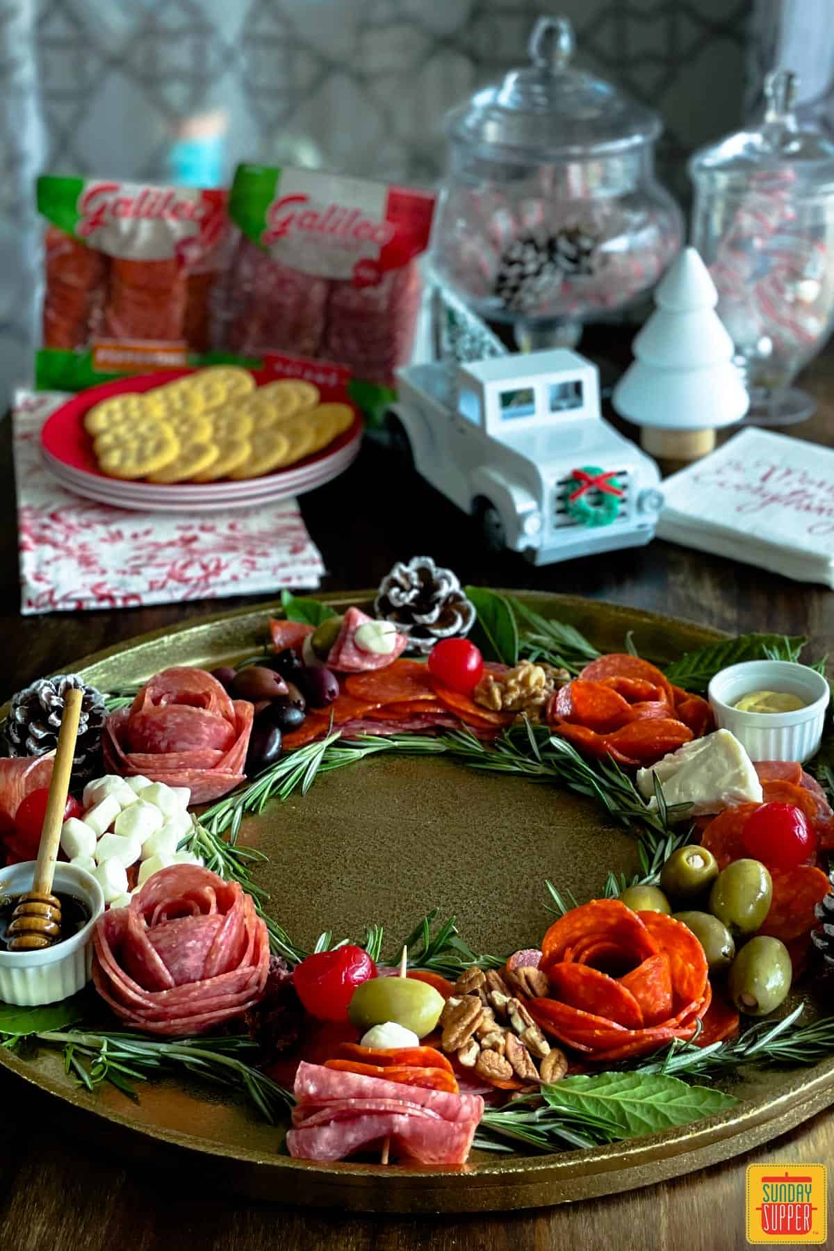 Beautiful holiday charcuterie board with meat roses