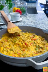 cheese sauce in with peppers and onions