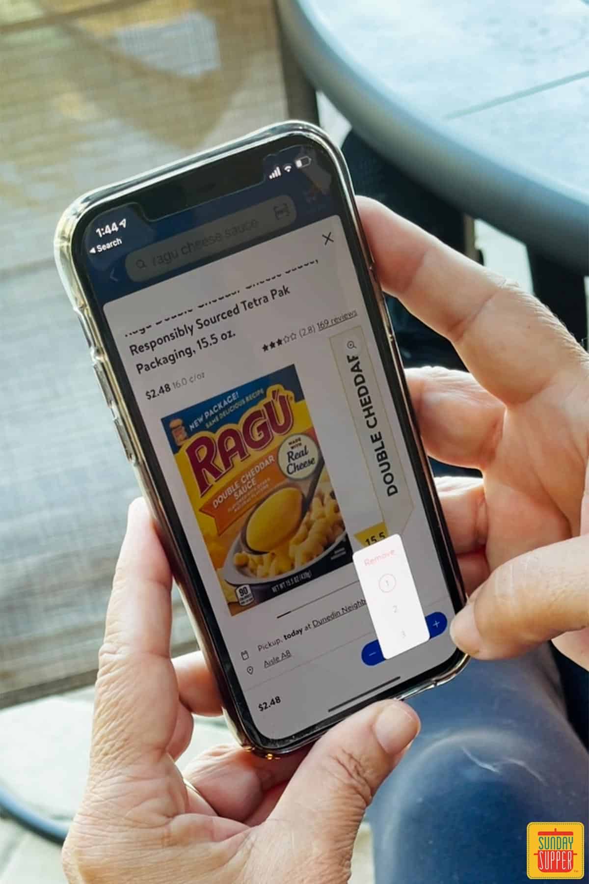 checking cheese sauce on Walmart app
