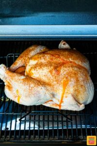 Turkey placed in the smoker