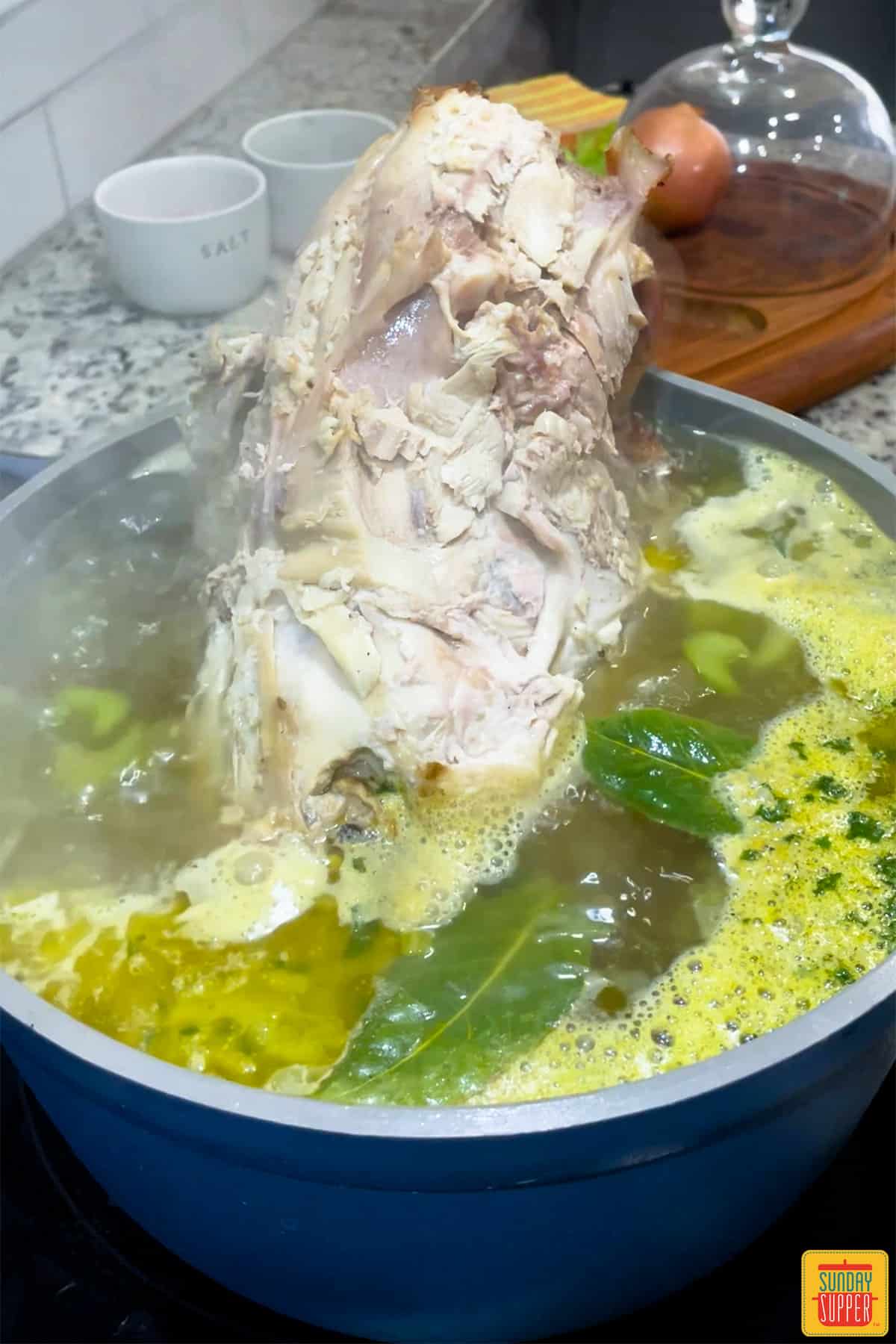 Turkey carcass soup boiling