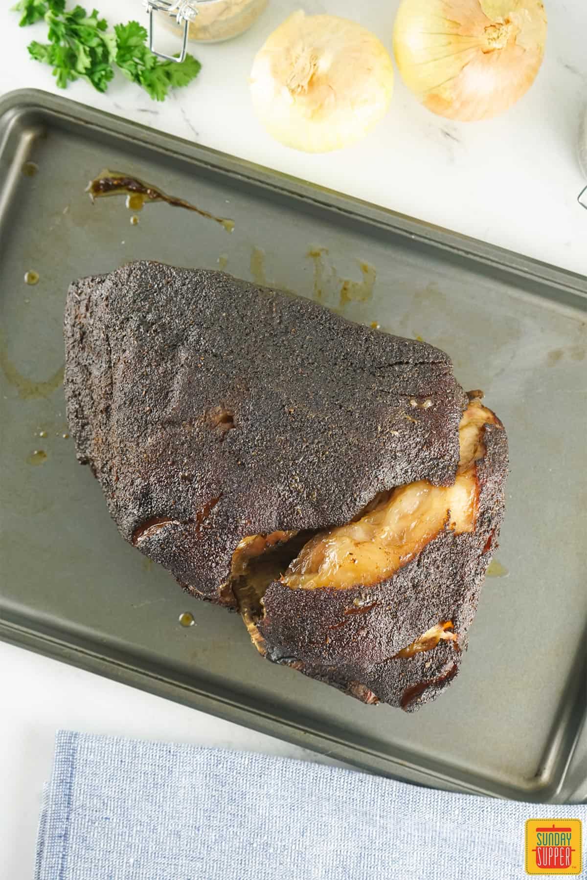 Smoked pork butt on the sheet pan