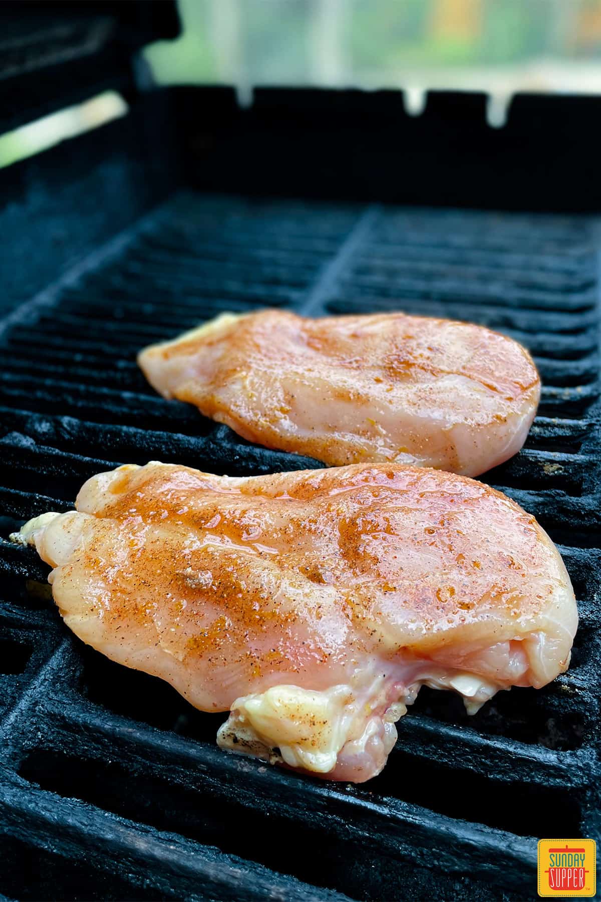 Chicken cooking on the grill