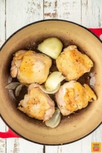 Cooking chicken thighs with onions