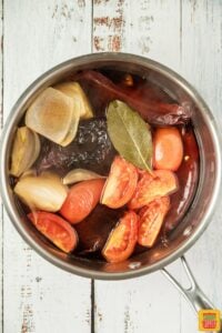 Cooking veggies with bay leaf and peppers