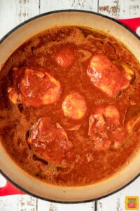 Chicken birria cooking in pot