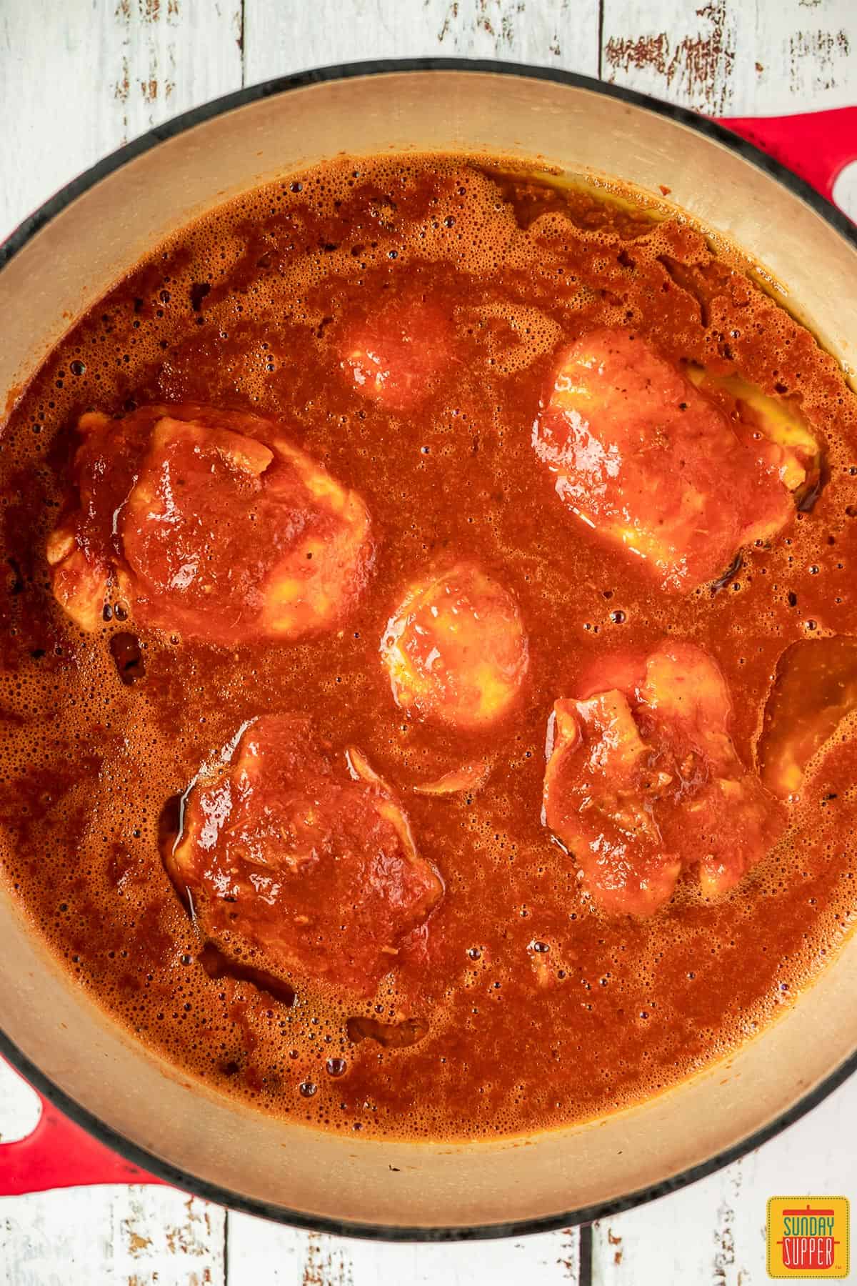 Chicken birria cooking in the pot