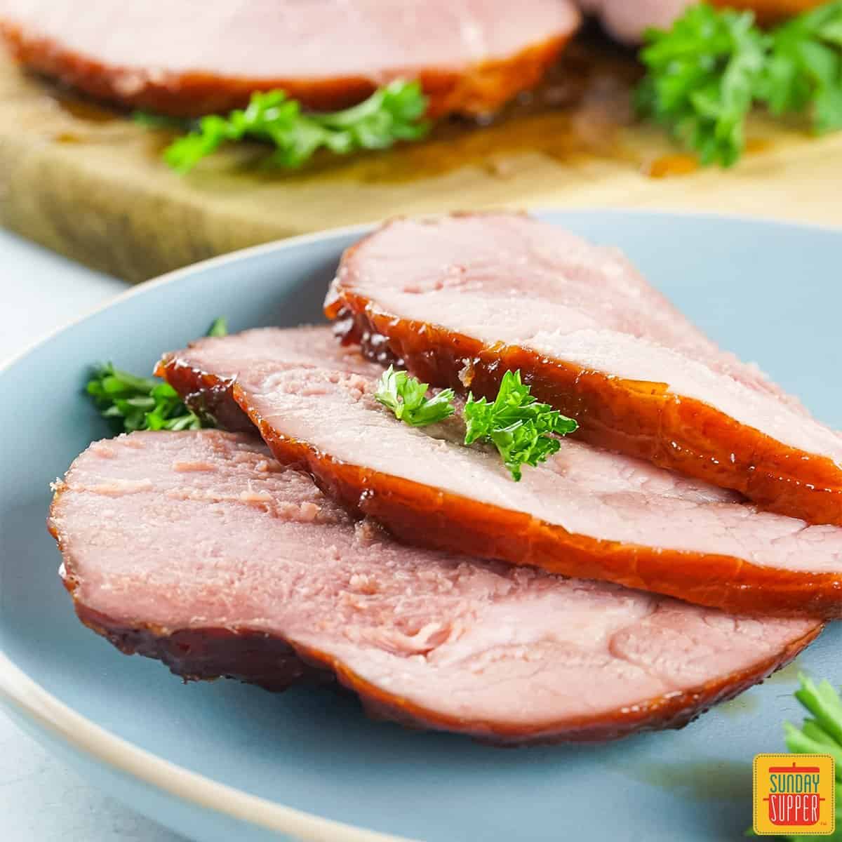 Slices of smoked ham on a plate