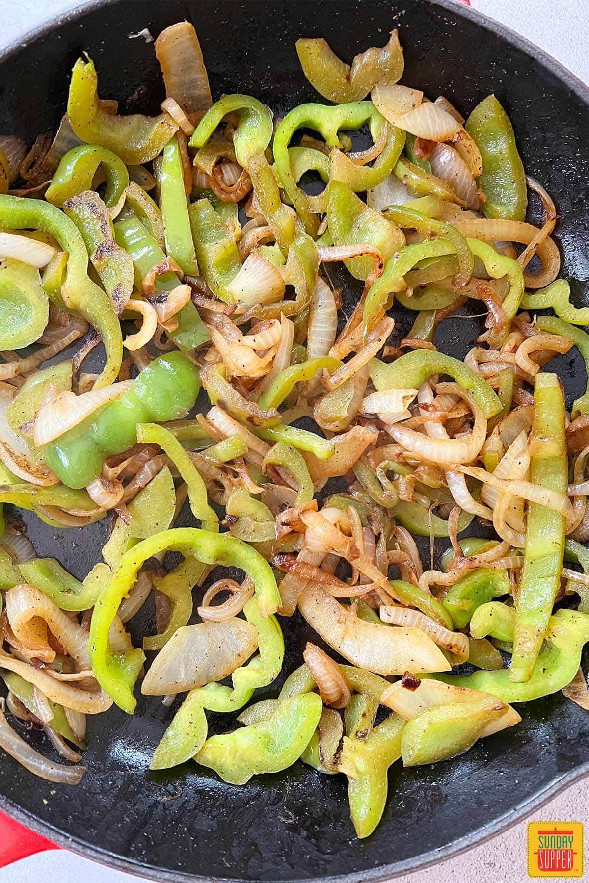 Seasoned Peppers and Onions in Skillet