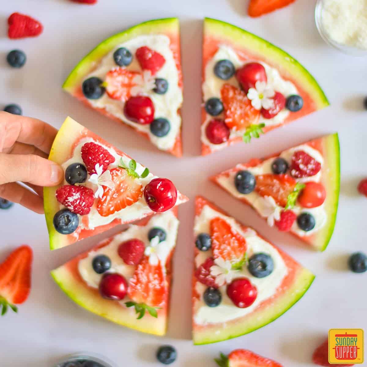 watermelon pizza slices with fresh fruit
