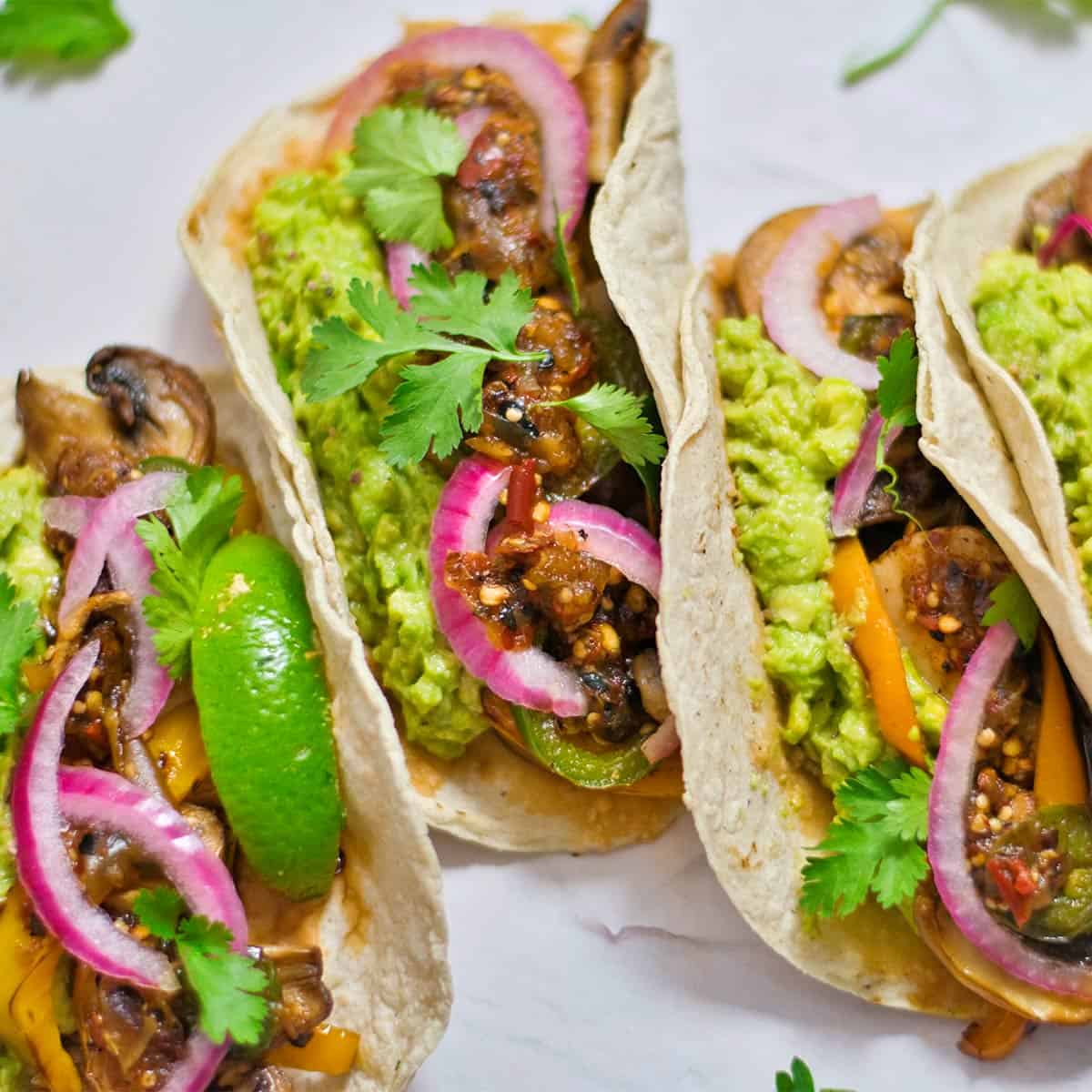 three mushroom tacos up close