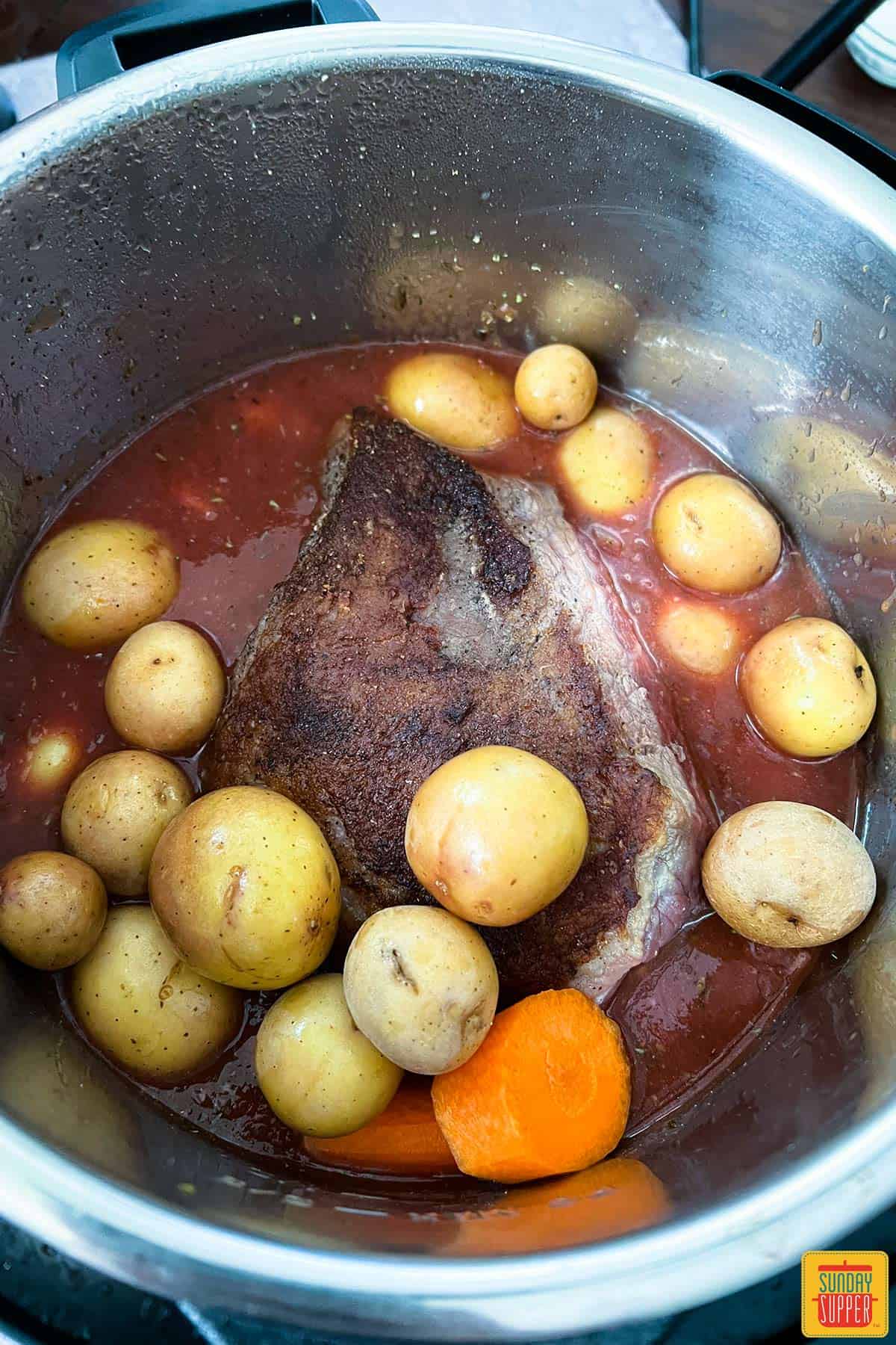 chuck roast in instant pot with potatoes and carrots