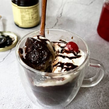 brownie in a mug with a cherry on top