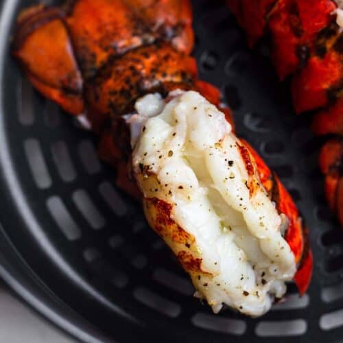 Close up of lobster tail in air fryer basket