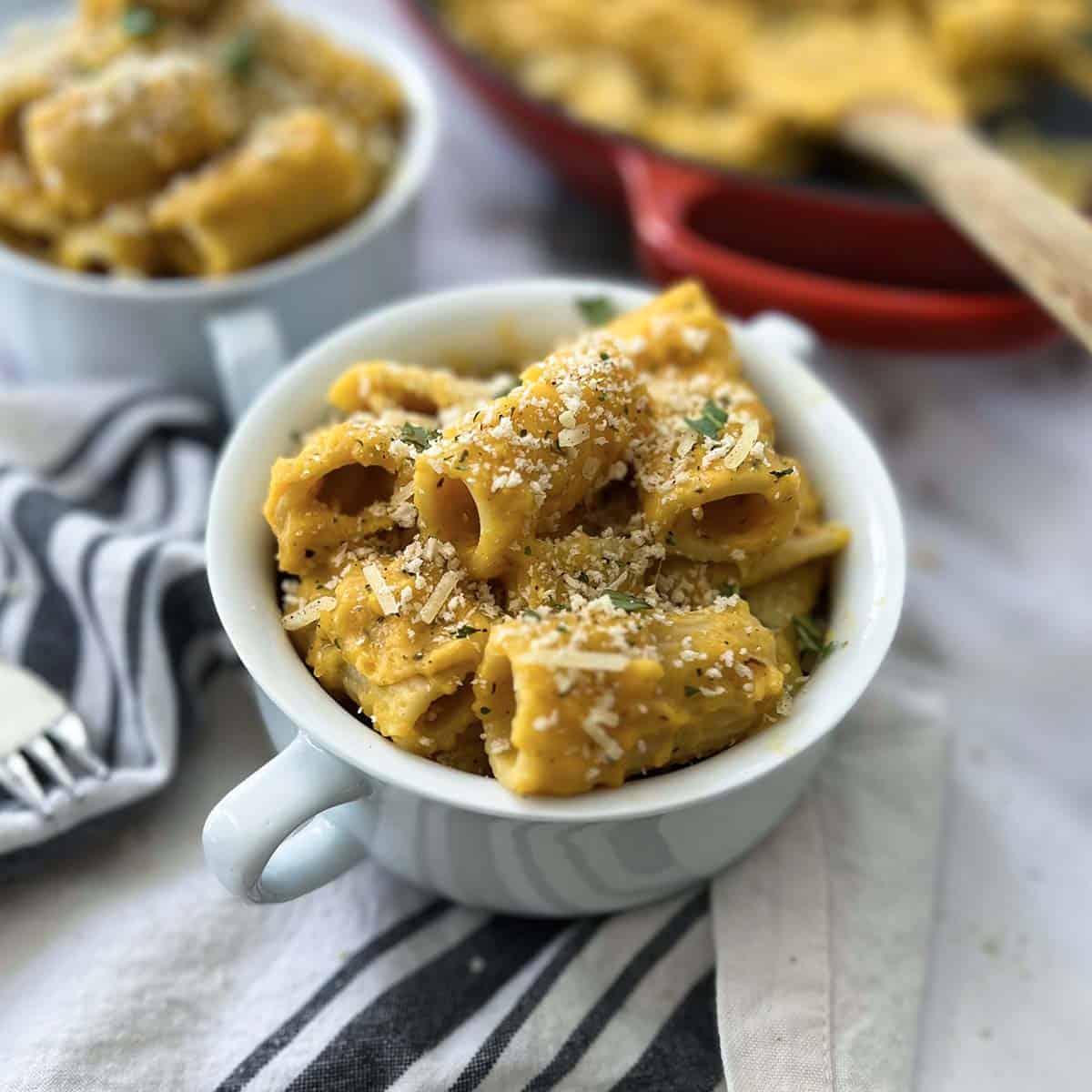 butternut squash mac and cheese in a white bowl