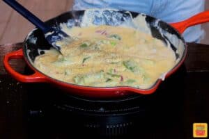 cheese and peppers sauce in skillet