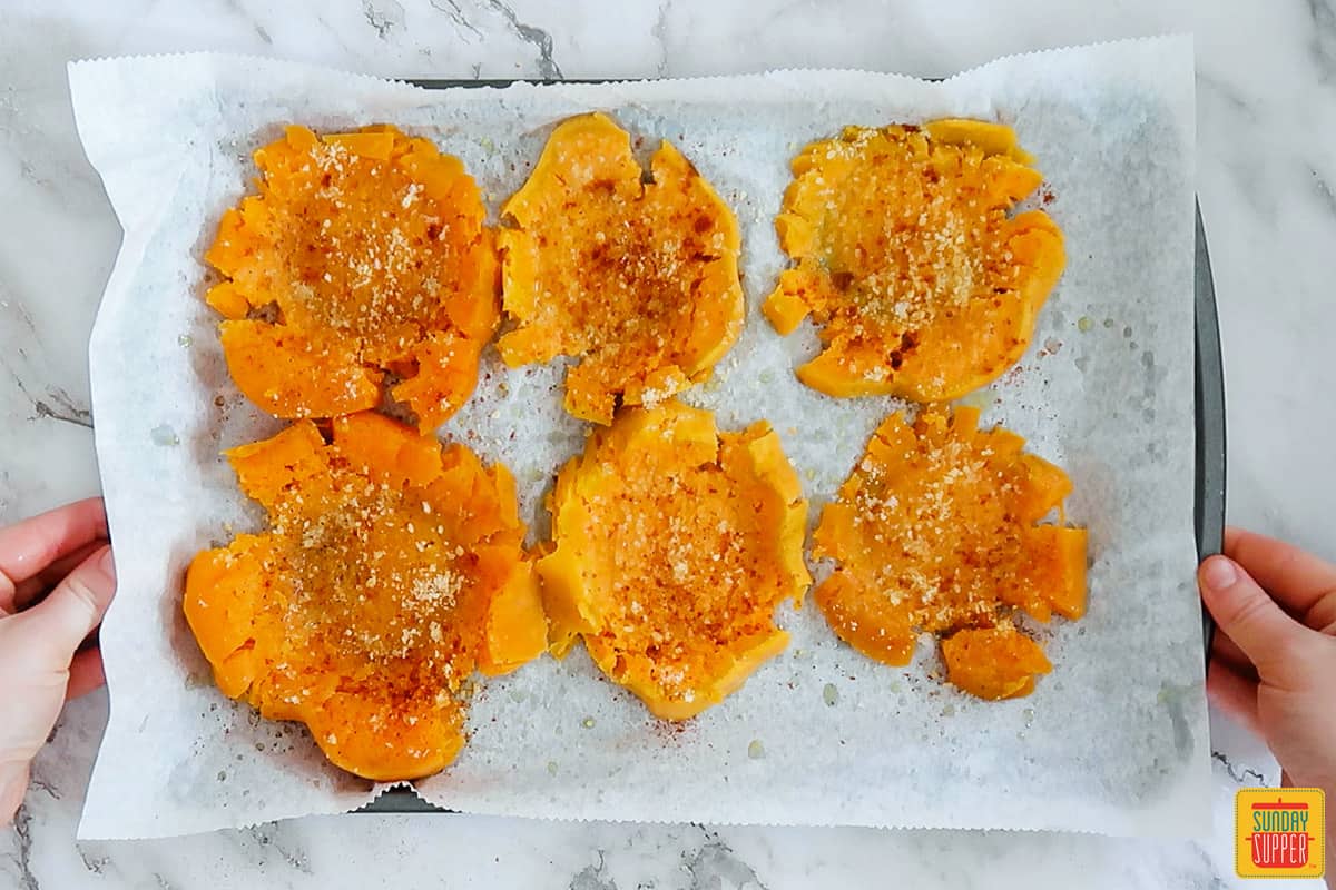 smashed sweet potatoes going in the oven