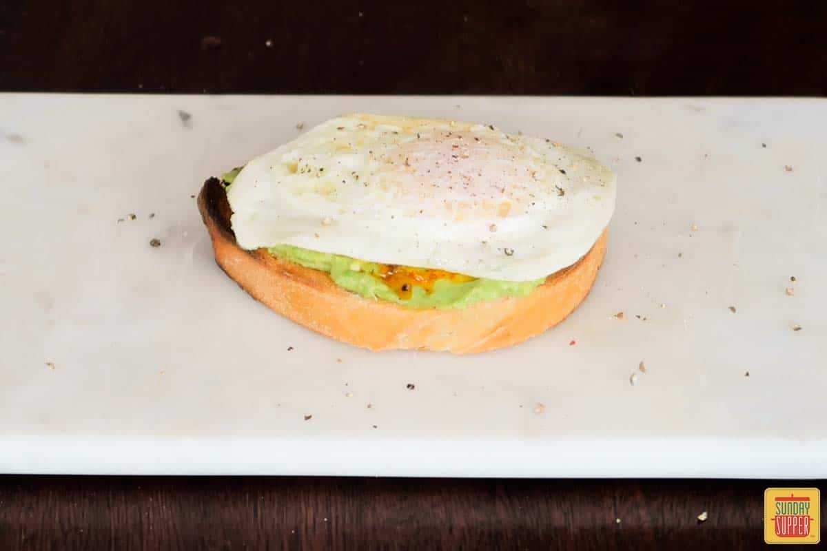 over-easy egg on top of avocado toast