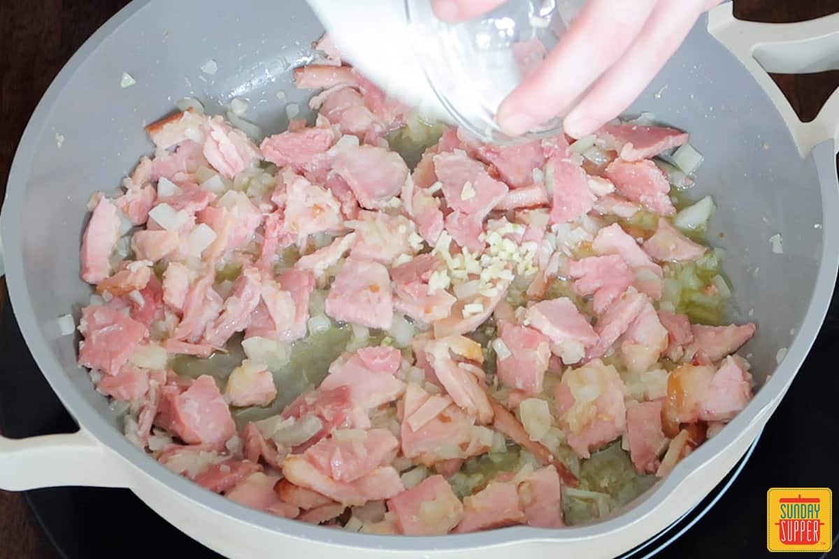 diced ham in a skillet