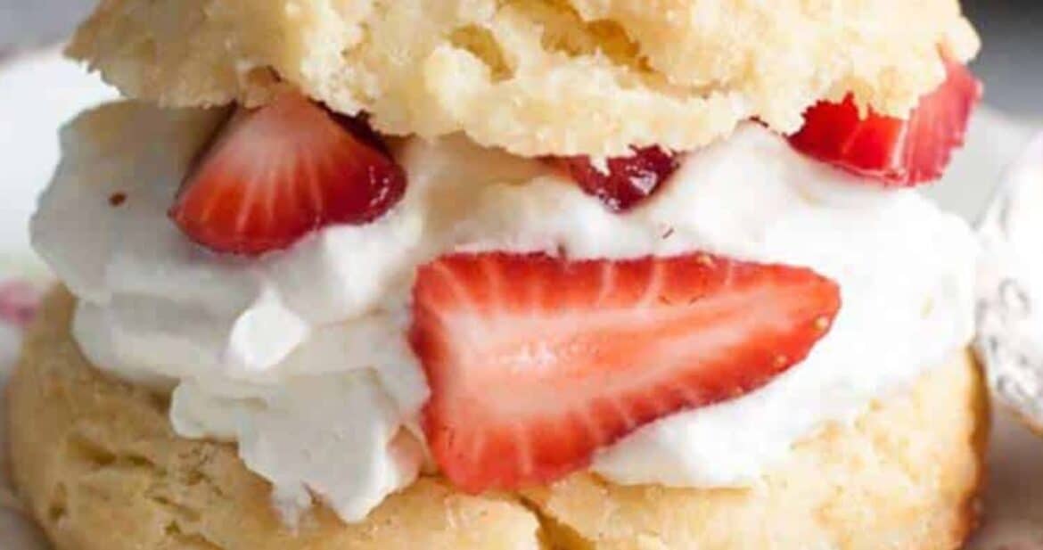 strawberry shortcake biscuits with homemade whipped cream in the center