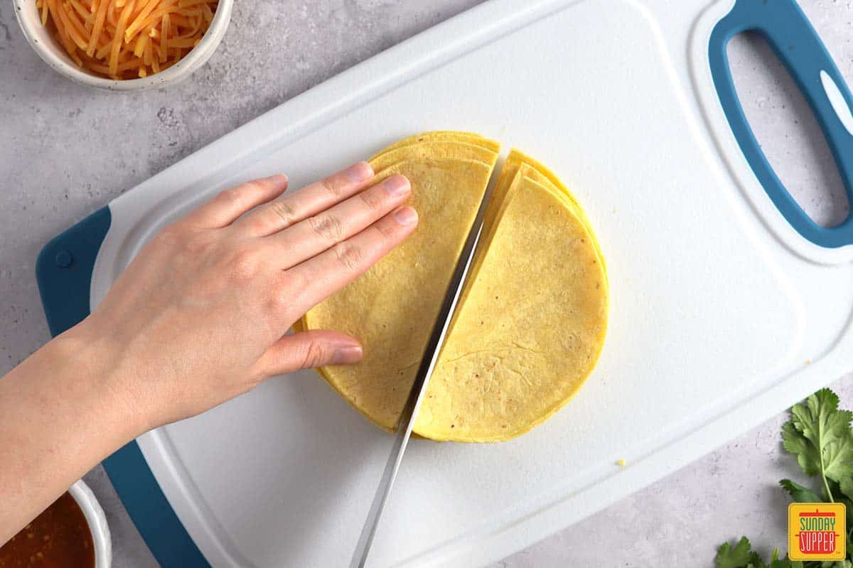 cutting tortillas in half