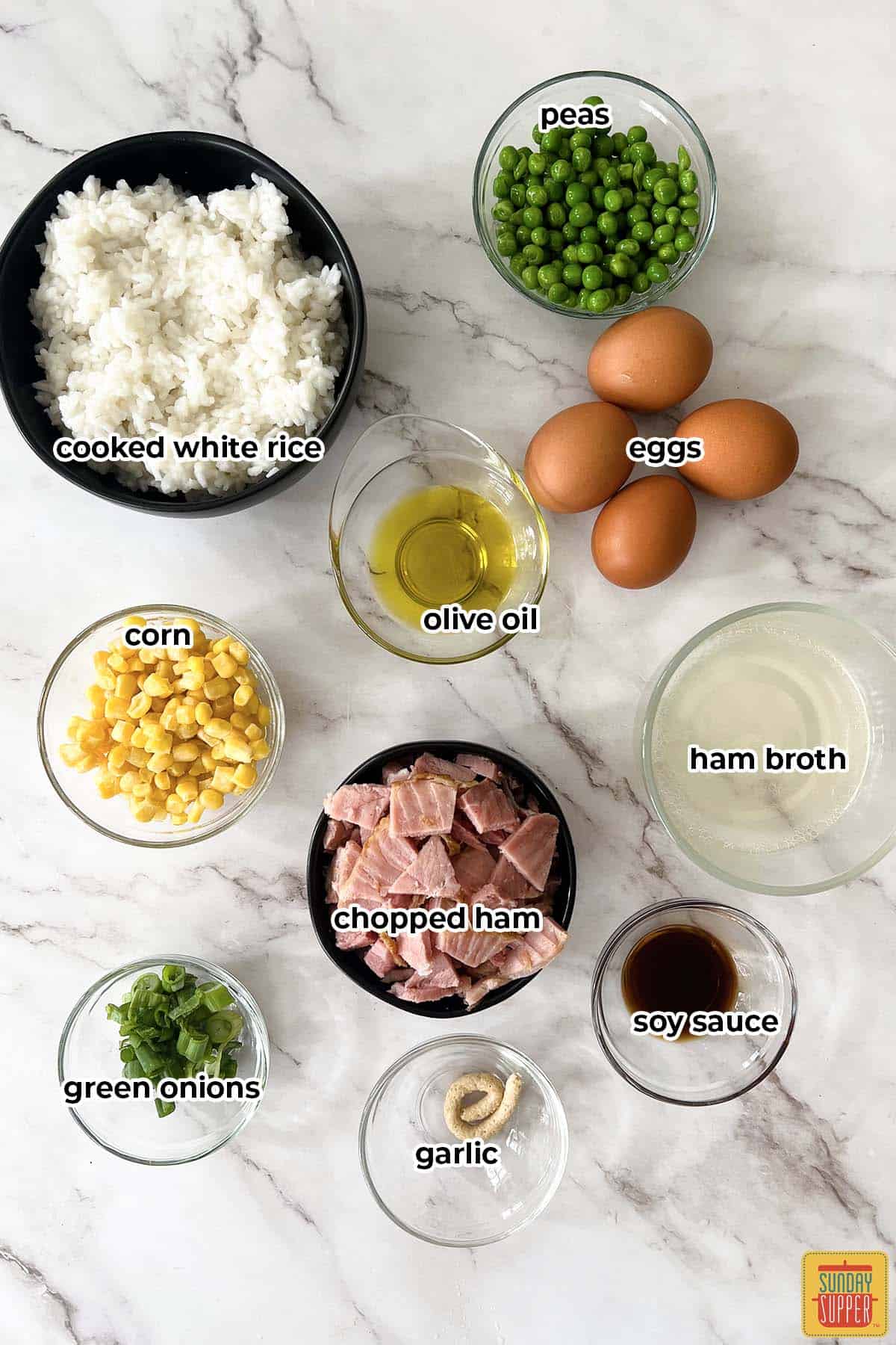 ingredients for fried rice with ham with labels in bowls